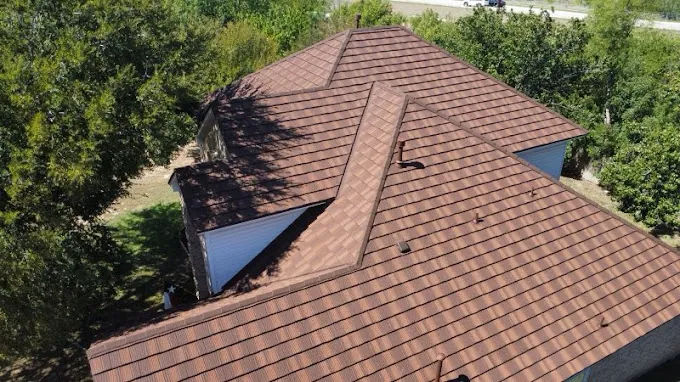 Drone view of a completed shingle roof replacement on a North Texas home